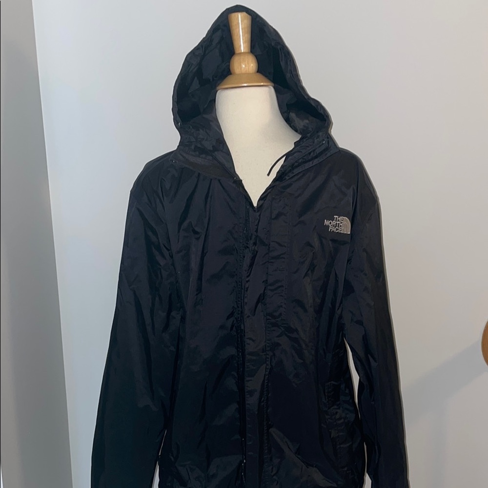 The North Face Black Raincoat with Hood and Water-Resistant Finish